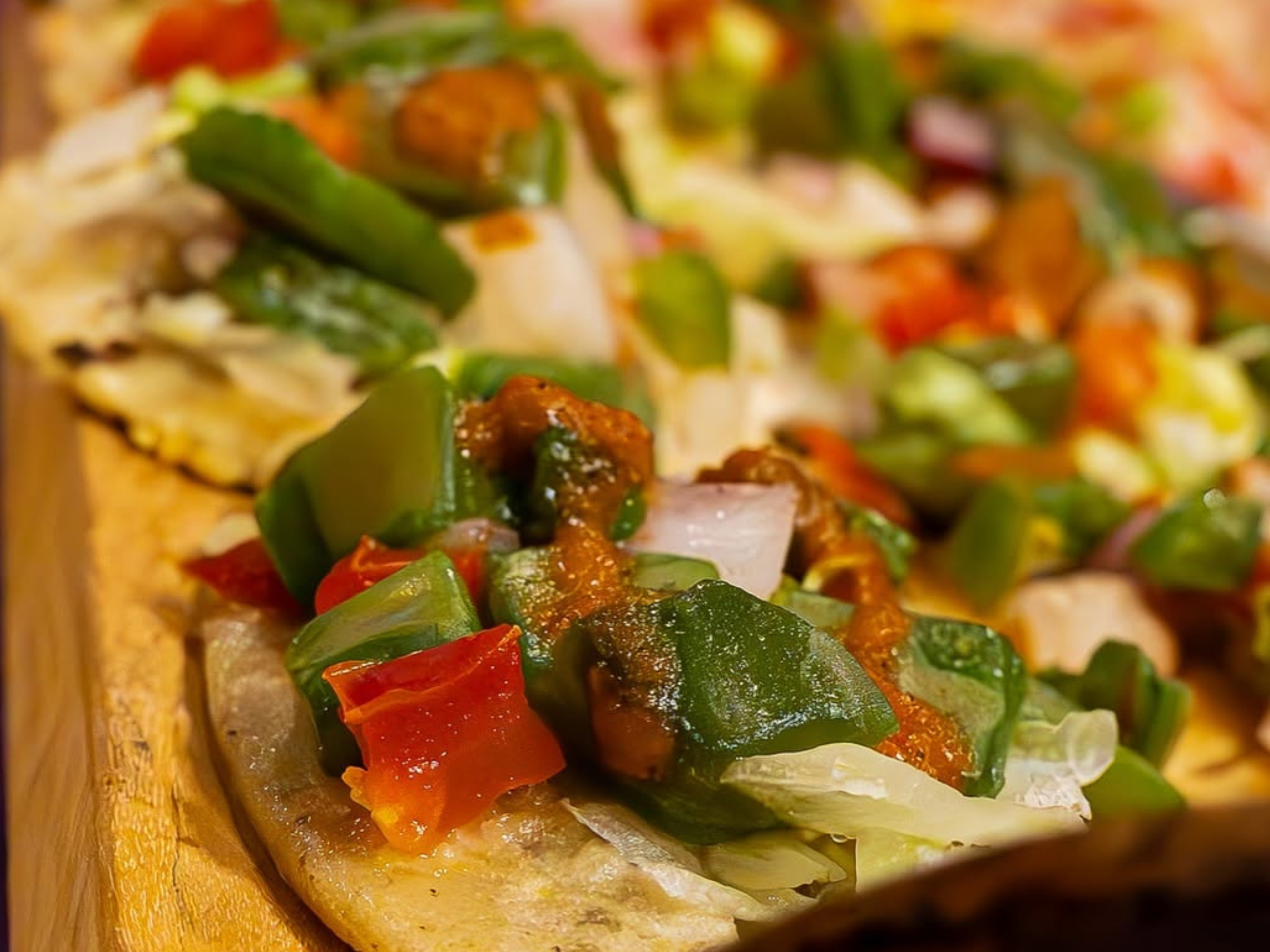 Mini huaraches catering tray, hand-sized for passing at a mixer